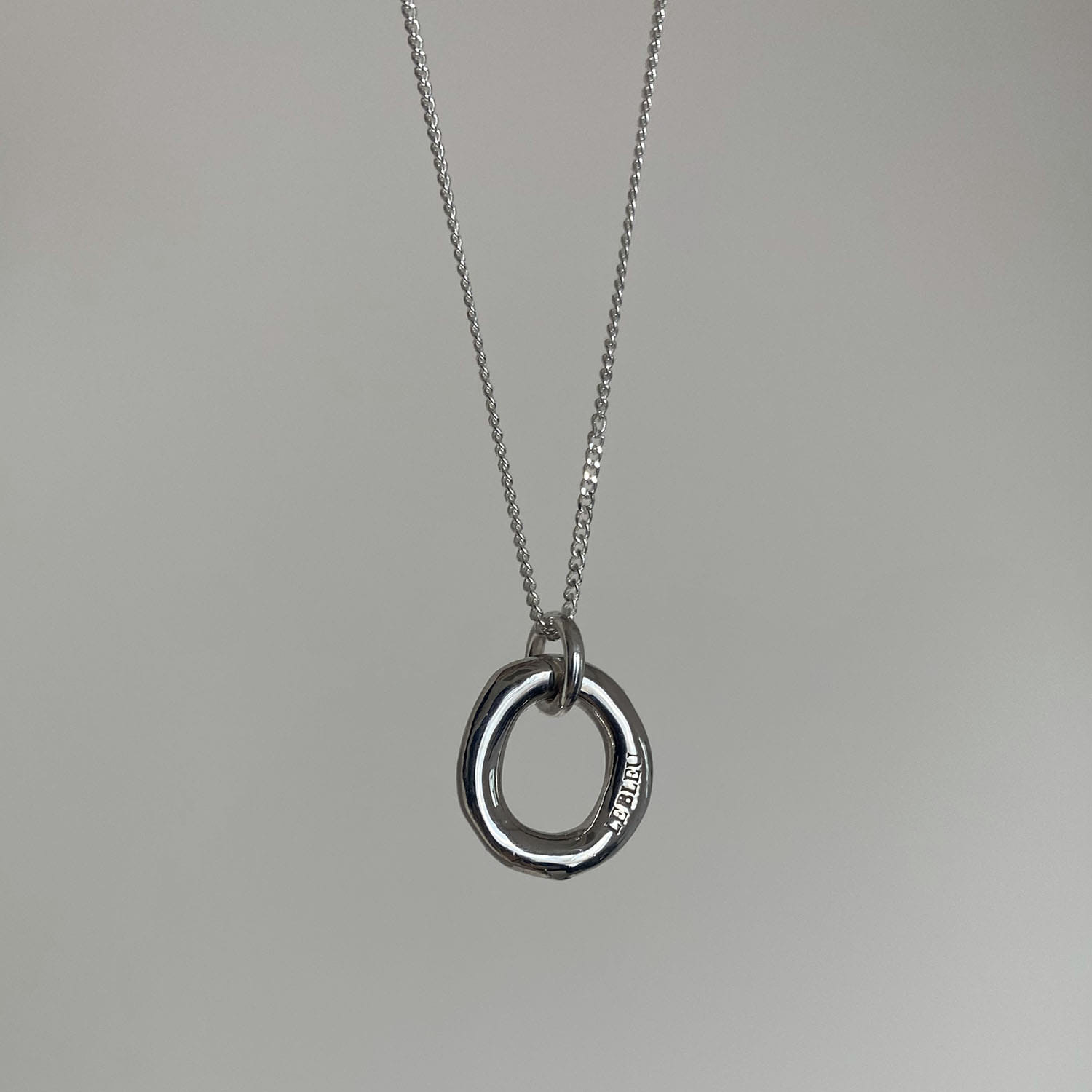 silver ring neck.